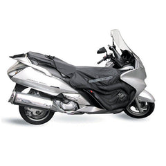 Coprigambe Termoscud®, un coprigambe impermeabile con fodera termica. Su scooter. Di TUCANO URBANO.
