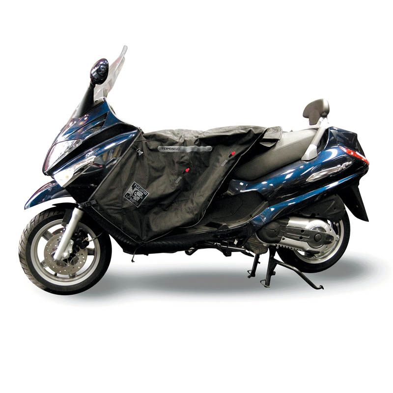Coprigambe Termoscud R045X, un coprigambe impermeabile con fodera termica. Utilizzato su scooter. Di Tucano Urbano.