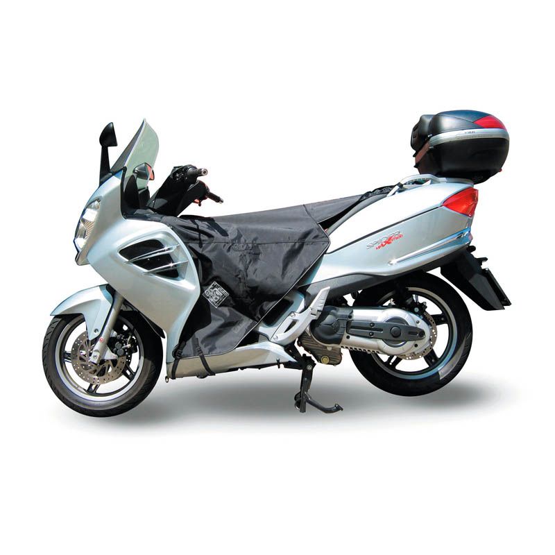 Coprigambe Termoscud®, un coprigambe impermeabile con fodera termica. In uso su scooter. Di TUCANO URBANO.