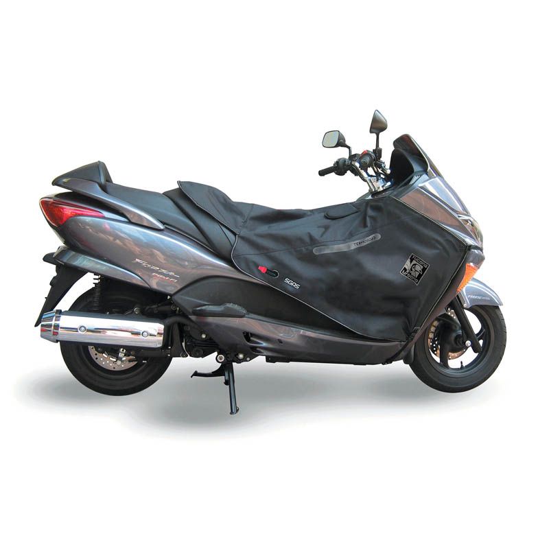 Coprigambe Termoscud R050X, un coprigambe impermeabile con fodera termica. In uso su scooter. Di TUCANO URBANO.