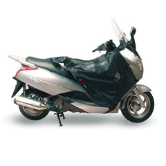 Coprigambe Termoscud®, un coprigambe impermeabile con fodera termica. Su scooter. Di TUCANO URBANO.