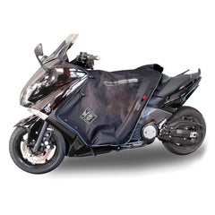 Coprigambe Termoscud®, un coprigambe impermeabile con fodera termica. In uso su scooter. Di TUCANO URBANO.