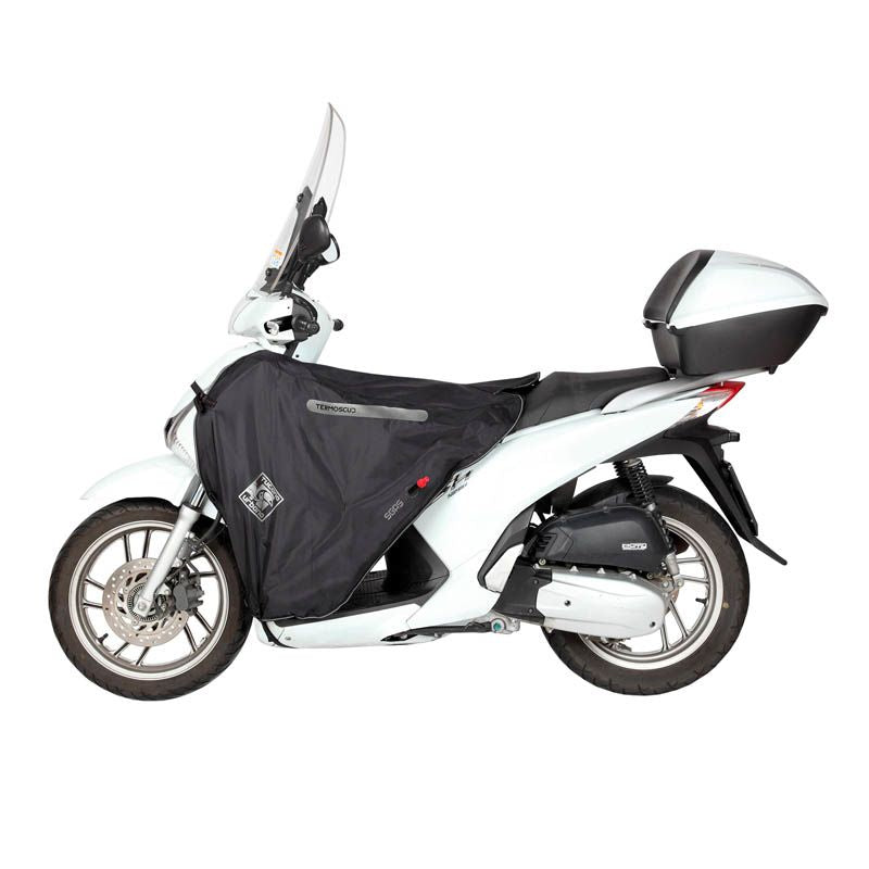 Termoscud R099X, un coprigambe impermeabile con fodera termica. Utilizzato su scooter. Di Tucano Urbano.