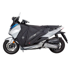 Coprigambe Termoscud® PRO, un coprigambe impermeabile e termico. Utilizzato su scooter. Di TUCANO URBANO.