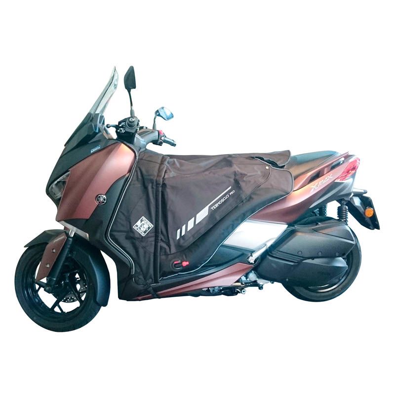 Coprigambe Termoscud PRO, un coprigambe impermeabile con fodera termica. Utilizzato su scooter. Di TUCANO URBANO.