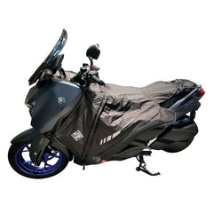 Coprigambe Termoscud PRO, un coprigambe in poliammide nero. Protezione e comfort per scooter e moto. Di TUCANO URBANO.